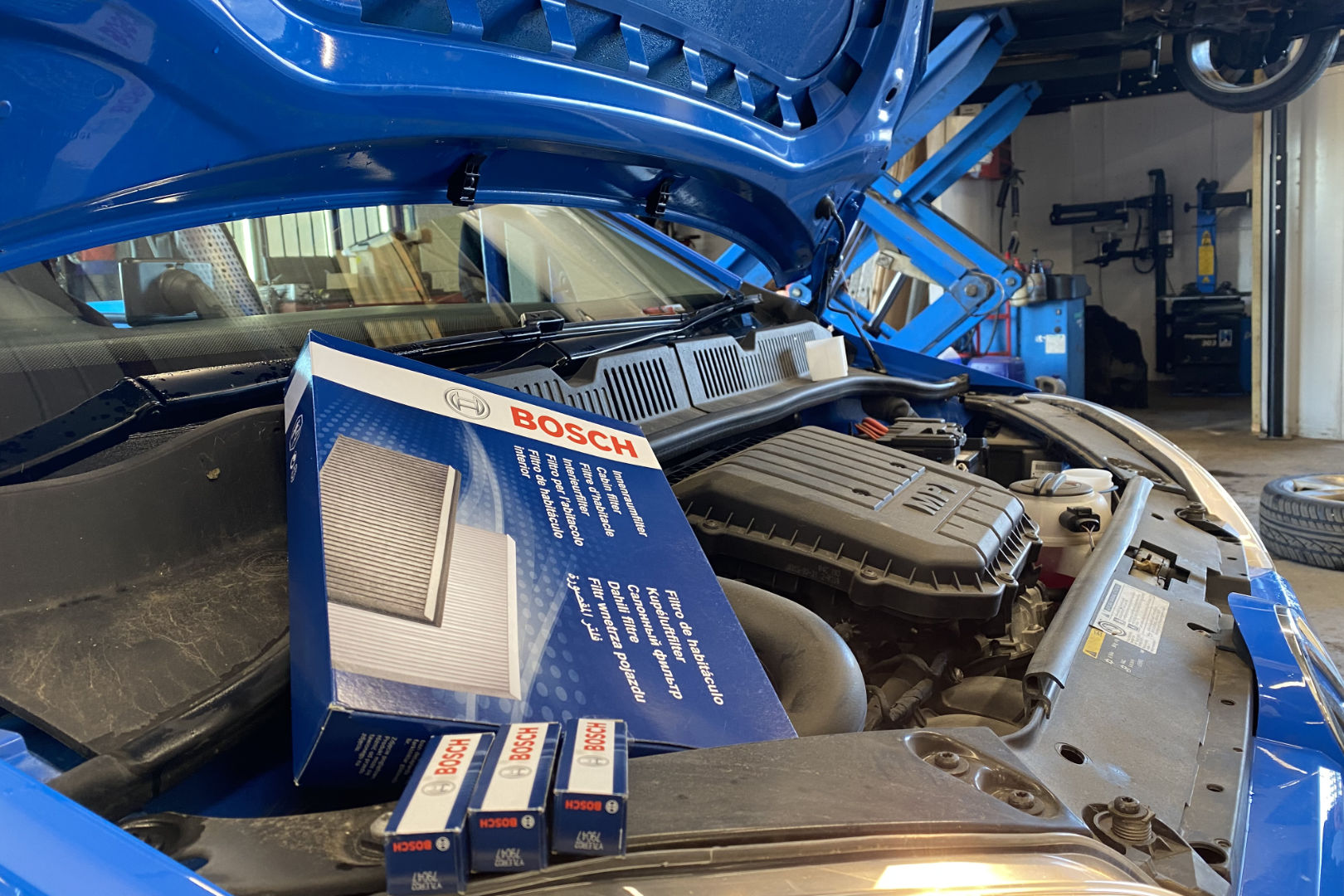 Picture of car being serviced with Bosch filters